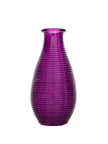 Ribbed purple glass vase isolated on a white background.