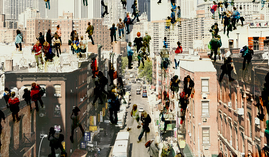 Shot of unrecognizable people climbing on buildings. The city is NYC, Chinatown, Manhattan.