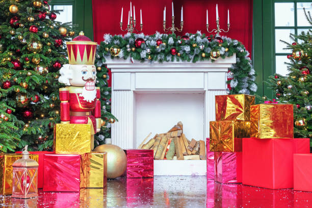 istock Nutcracker, Christmas tree, fireplace and boxes with Christmas gifts. Christmas composition. 1363132510