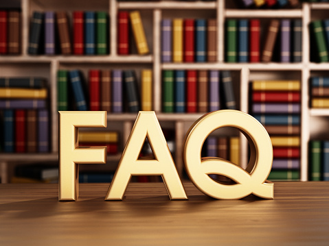 FAQ (Frequently Asked Questions) text and library shelves with colorful books.