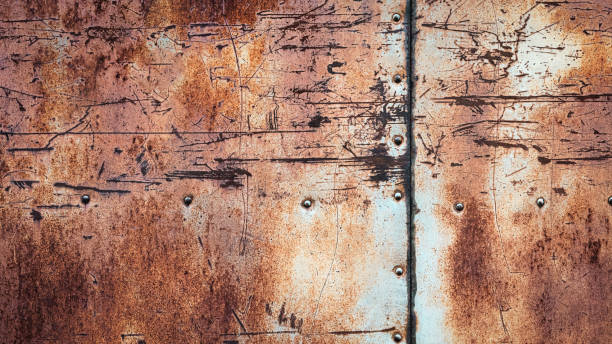 istock Rusty metal background, scratches stains rivets and seams on textured iron wall 1363135767