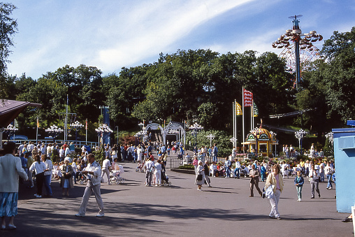 Goteborg, Sweden - aug 8, 1987: crowd of adults and children in the Liseberg amusement park