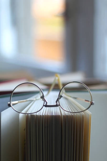 istock Hardcover Books and Reading Glasses 1363136152