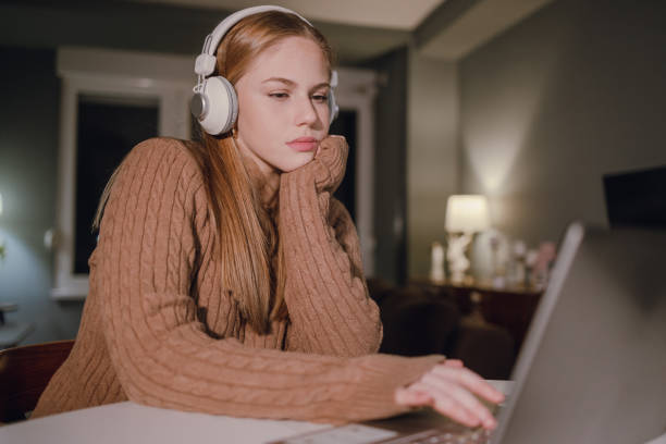 istock Working late at home on laptop and trying to concentrate on work 1363136668