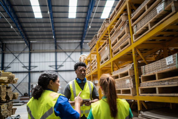 istock Inspector talking to colleagues in a factory/industry 1363138675