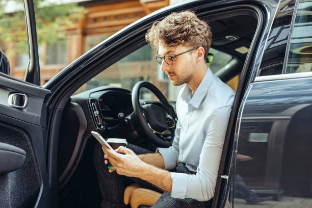 istock Man driving his car 1363138696