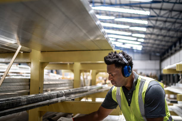 istock Employee working in a factory 1363138778