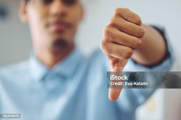 Hand Sign Stock Photo - Download Image Now - Thumbs Down, Rejection, Men
