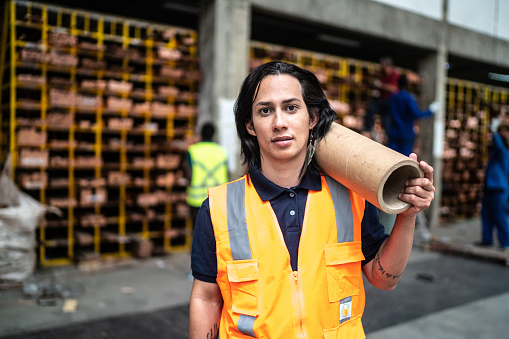 Portrait of a non-binary person at a warehouse