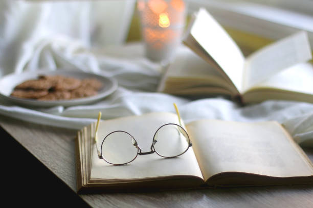 istock Candle, Books and Cookies 1363141618