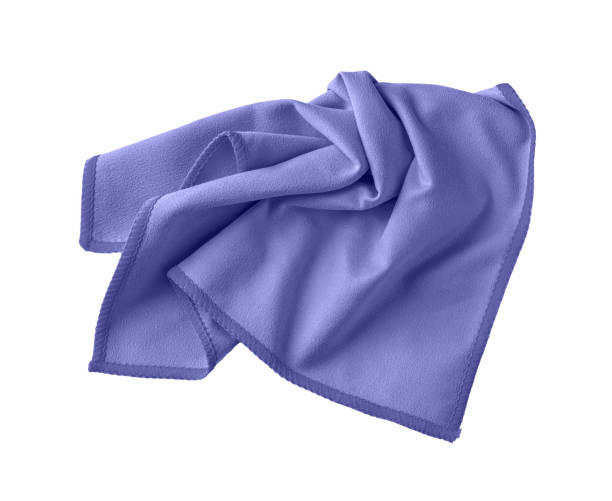 istock Crumpled blue violet microfiber cloth isolated on white background. Soft micro fiber napkin for cleaning objects and surfaces in trendy color of the year 2022 very peri. Housework, cleaning. 1363143973