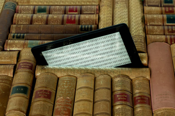 istock old books on the shelf with a tablet in between 1363143987