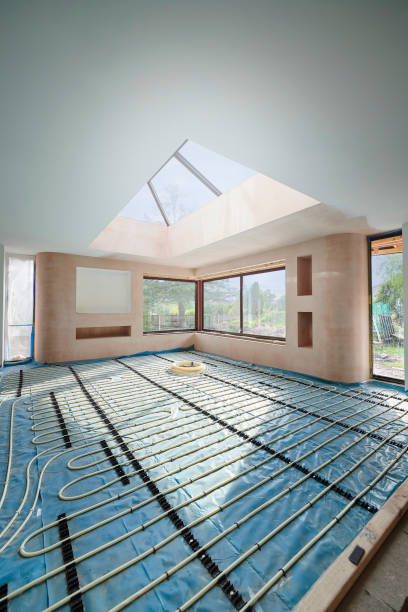 aquecimento de extensão doméstica no chão - home addition building activity uk construction - fotografias e filmes do acervo