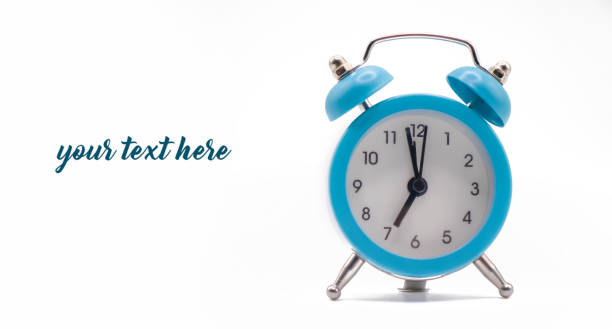 istock blue alarm clock isolated on white background 1363153043