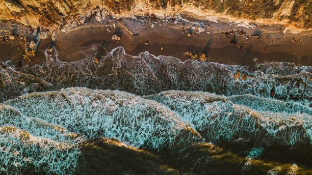 powietrze nad falami o zachodzie słońca - beach sunset sand wood zdjęcia i obrazy z banku zdjęć