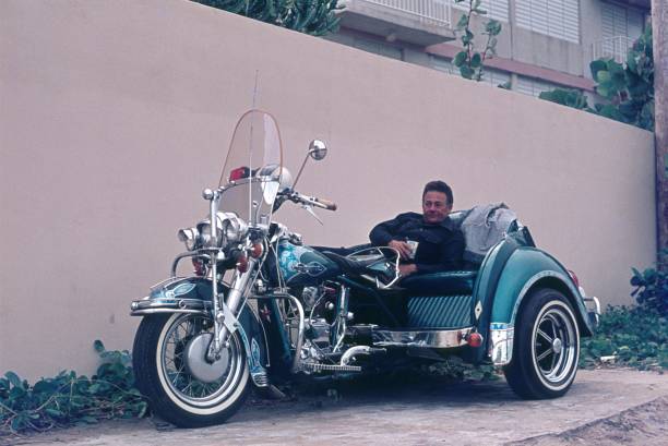 San Juan, Puerto Rico, USA, 1977. A trike motorcycle with owner.