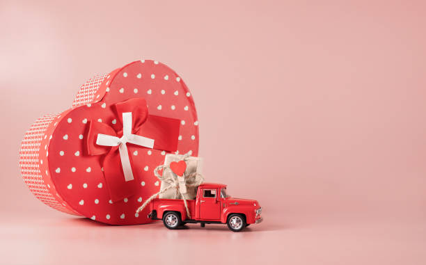 istock Bright packaging for purchases, gifts and parcels on a pink background 1363162615