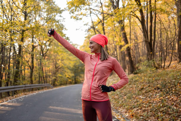 istock Middle aged Caucasian woman getting ready for her daily jogging routine 1363167330
