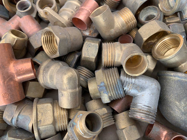 istock Copper and brass plumbing pieces 1363169271