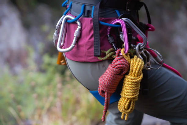 girl with mountaineering equipment outdoor. - haak apparatuur stockfoto's en -beelden