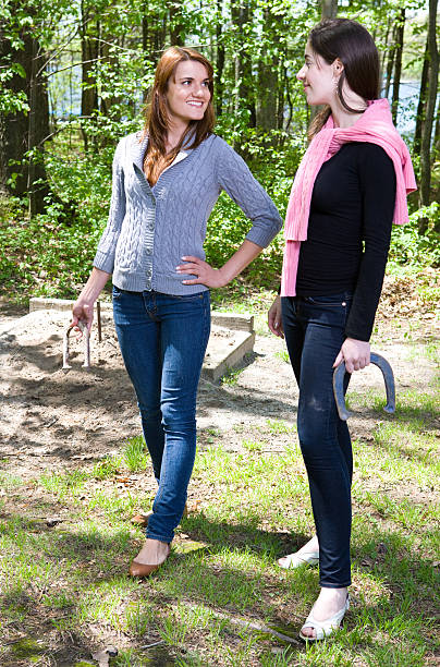 istock Two Women Playing Horse Shoes 136318355