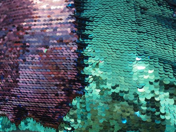 istock Purple and Turquoise Mermaid Sequin Fabric Close Up Abstract 1363186322