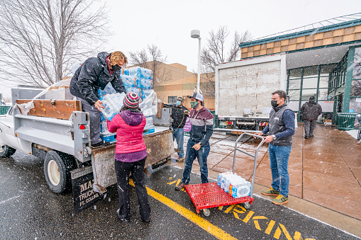 Lafayette, CO USA- December 31, 2021.   Volunteer's helping out the Red Cross at the YMCA after the Marshall Fire ripped through Louisville and Superior, CO