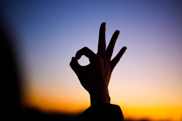 istock Sunset gradation and body parts silhouette 1363188752
