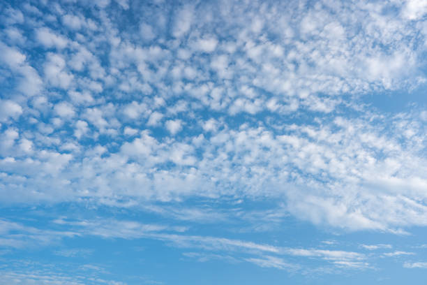 istock Blue sky and white clouds background on daytime 1363189209