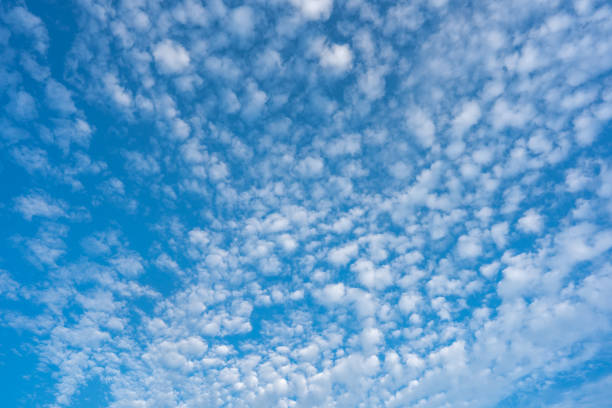 istock Blue sky and white clouds background on daytime 1363189248