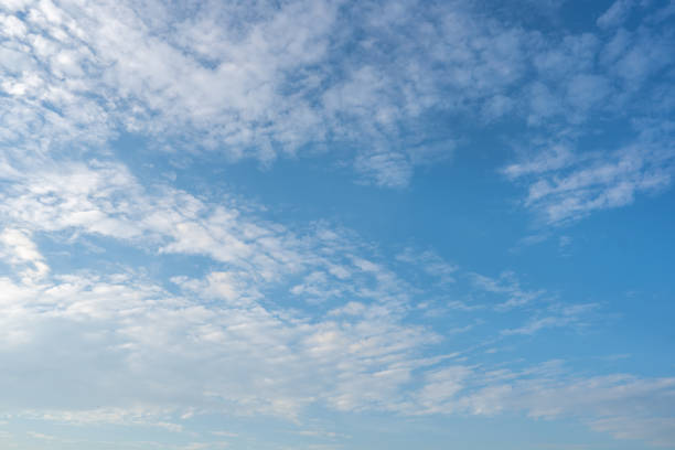 istock Blue sky and white clouds background on daytime 1363189257