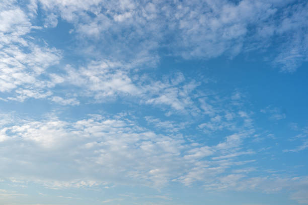 istock Blue sky and white clouds background on daytime 1363189314
