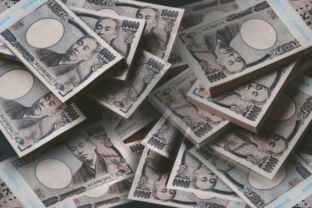 fondo de fajos japoneses apilados - money roll fotografías e imágenes de stock