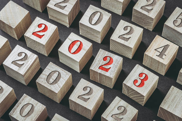 istock Black background with wooden blocks for the year 1363192625
