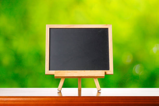 istock Blackboard and green blur background 1363192682
