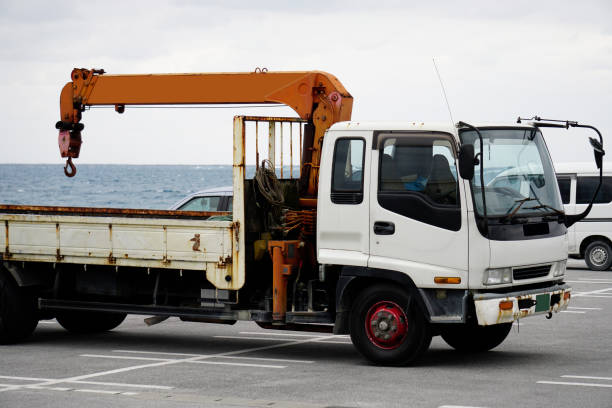 istock White truck with crane parked 1363193512