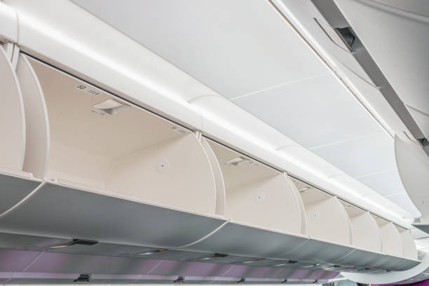 istock Boxes for hand luggage in airplane. 1363198860