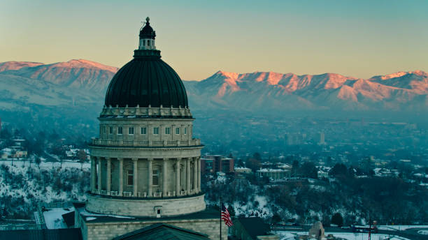 istock Last Light on Snowy Wasatch Mountains Behind Utah State Capitol Building - Aerial 1363199097