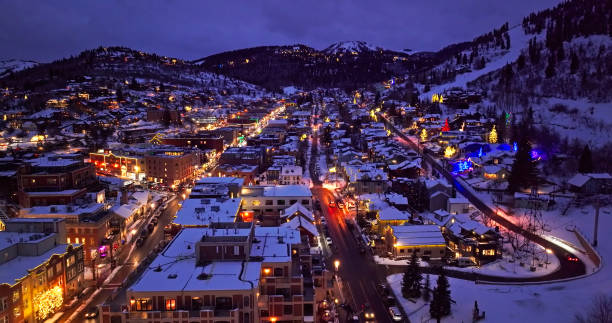 istock Wintry Streets in Park City at Night During Holidays - Aerial 1363201539