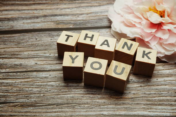 istock Thank You alphabet letters with space copy on wooden background 1363203320