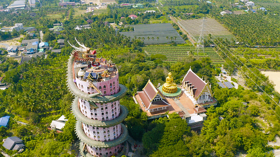 Aerial view of Wat Samphran or Chinese Dragon Temple in Sam Phran District in Nakhon Pathom province near Bangkok Urban City, Thailand. Tourist attraction landmark in travel trip concept.