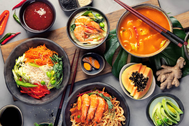 istock Asian dishes variety on gray background. 1363216849