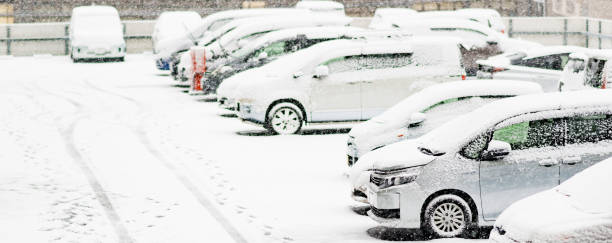 istock Japanese snowy parking area and car 1363220329