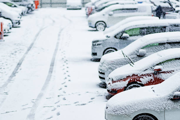 istock Japanese snowy parking area and car 1363220334