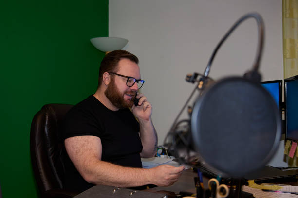 istock Business man in the office talking on a phone 1363226697