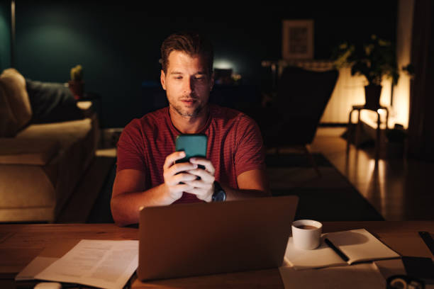 istock Serious Businessman Working at Home at Night 1363227306
