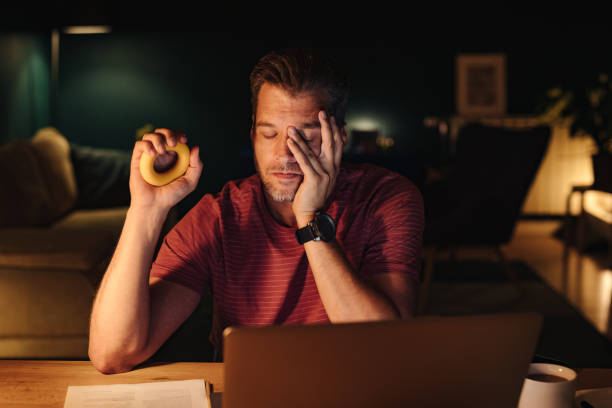 istock Tired Businessman Working at Home at Night 1363227319