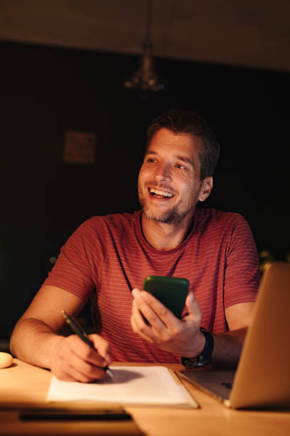 istock Happy Businessman Working at Home at Night 1363227321