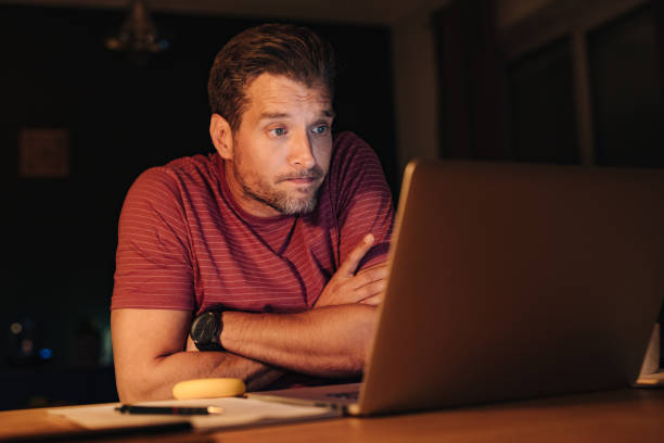 istock Serious Businessman Working at Home at Night 1363227324