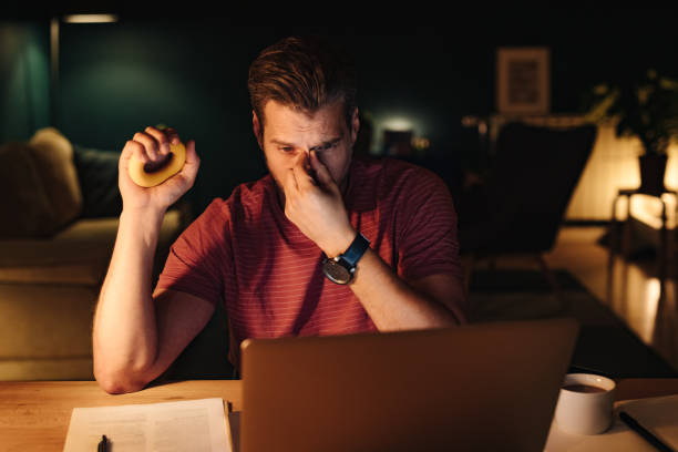 istock Tired Businessman Working at Home at Night 1363227332